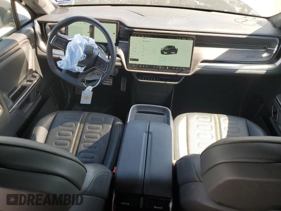 2022 Rivian R1T Adventure z VIN 7FCTGAAA5NN015734, wystawiony jako Copart lot #44019715 z przebiegiem 27 542 mil mil oraz Szkody całkowita. Historia ofert i sprzedaży dostępna na DreamBid. Obrazek 10.