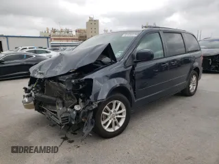 2014 Dodge Grand Caravan SXT with VIN 2C4RDGCGXER209286, listed as a Copart auction lot 51536975 with 173,821 mi miles and Salvage Title. Bid and sale history available at DreamBid. Image 1.