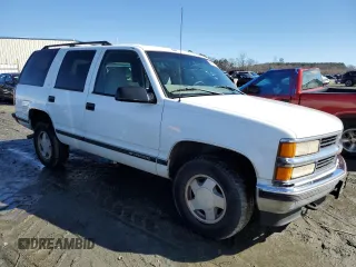 1998 Chevrolet Tahoe z VIN 1GNEK13R8WJ372101, wystawiony jako Copart lot #42957075 z przebiegiem 174 853 mil mil oraz Szkoda całkowita • Salvage title. Historia ofert i sprzedaży dostępna na DreamBid. Obrazek 4.