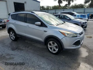 2013 Ford Escape SE with VIN 1FMCU9GX0DUC37218, listed as a Copart auction lot 53992485 with 188,571 mi miles and Salvage Title. Bid and sale history available at DreamBid. Image 4.