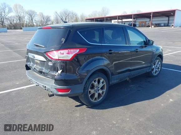 2013 Ford Escape SEL with VIN 1FMCU9H95DUA46183, listed as a IAAI auction lot 41903684 with 243,026 mi miles. Bid and sale history available at carsss.com. Image 4.
