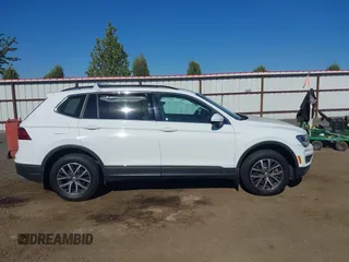 2020 Volkswagen Tiguan SE with VIN 3VV2B7AXXLM053170, listed as a IAAI auction lot 42203372 with 112,794 mi miles and . Bid and sale history available at DreamBid. Image 14.