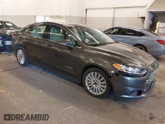 2016 Ford Fusion SE Hybrid with VIN 3FA6P0LU9GR235291, listed as a IAAI auction lot 41560312 with 112,777 mi miles. Bid and sale history available at carsss.com. Image 1.