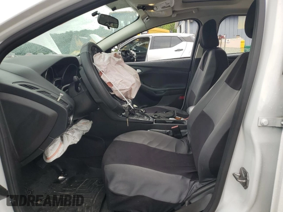 2015 Ford Focus SE with VIN 1FADP3F24FL282695, listed as a Copart auction lot 64051245 with 142,039 mi miles and Clean title. Bid and sale history available at DreamBid. Image 7.