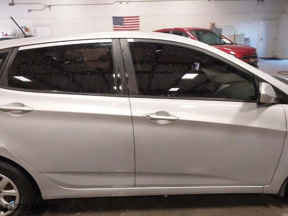 2013 Hyundai Accent GS with VIN KMHCT5AE4DU121779, listed as a IAAI auction lot 41250935 with 152,128 mi miles. Bid and sale history available at carsss.com. Image 14.