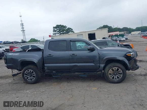 2022 Toyota Tacoma SR with VIN 3TMCZ5AN2NM507478, listed as a IAAI auction lot 42425907 with 40,796 mi miles and . Bid and sale history available at DreamBid. Image 14.