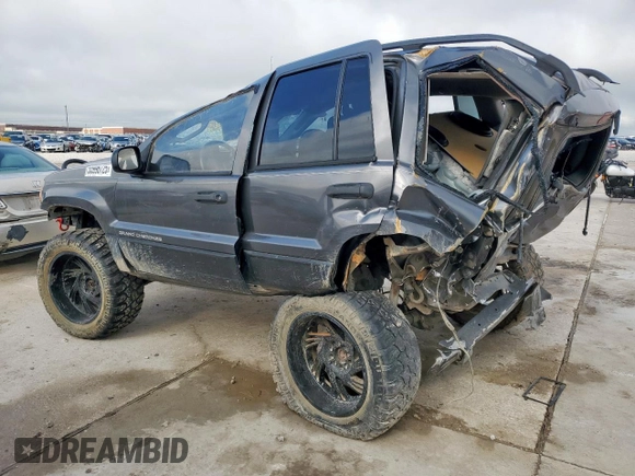 2003 Jeep Grand Cherokee Laredo with VIN 1J4GX48S63C604527, listed as a Copart auction lot 55996725 with Not provided miles and Non repairable. Bid and sale history available at DreamBid. Image 2.