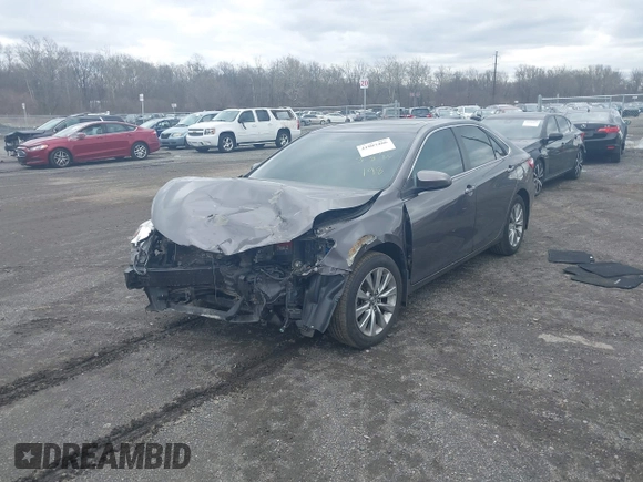 2015 Toyota Camry XLE with VIN 4T1BF1FKXFU936775, listed as a IAAI auction lot 41807486 with 97,148 mi miles and . Bid and sale history available at DreamBid. Image 18.