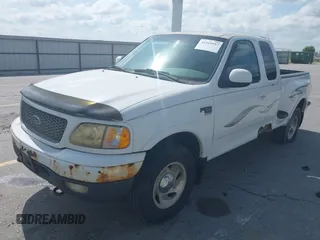 2000 Ford F-150 z VIN 2FTRX08W3YCA83858, wystawiony jako IAAI lot #42569957 z przebiegiem Nie podano mil oraz . Historia ofert i sprzedaży dostępna na DreamBid. Obrazek 17.