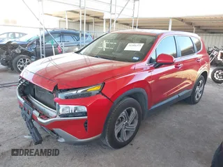 2021 Hyundai Santa Fe SE with VIN 5NMS14AJ5MH311823, listed as a IAAI auction lot 41301373 with 70,379 mi miles. Bid and sale history available at carsss.com. Image 2.