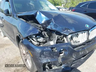 2015 BMW X5 xDrive50i z VIN 5UXKR6C58F0J78920, wystawiony jako IAAI lot #42053507 z przebiegiem 130 372 mil mil oraz . Historia ofert i sprzedaży dostępna na DreamBid. Obrazek 6.
