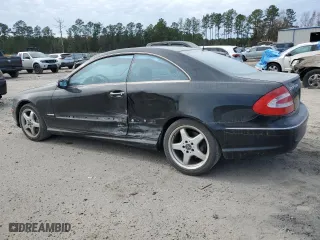 2004 Mercedes-Benz CLK-Class 5.0L with VIN WDBTJ75J54F091191, listed as a Copart auction lot 82981414 with 101,284 mi miles and Salvage Title. Bid and sale history available at carsss.com. Image 2.