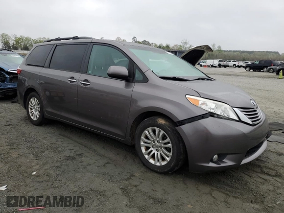 2015 Toyota Sienna XLE with VIN 5TDYK3DC6FS660035, listed as a Copart auction lot 51660075 with 176,968 mi miles and Salvage Title. Bid and sale history available at DreamBid. Image 4.