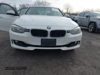 2013 BMW 3 Series 328i xDrive with VIN WBA3B5G5XDNS02162, listed as a IAAI auction lot 41484578 with 132,211 mi miles. Bid and sale history available at carsss.com. Image 12.