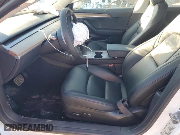 2023 Tesla Model 3 with VIN 5YJ3E1EA8PF548135, listed as a Copart auction lot 88732625 with 33,232 mi miles and Salvage Title. Bid and sale history available at DreamBid. Image 7.