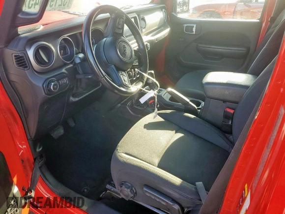 2020 Jeep Wrangler Unlimited Black and Tan with VIN 1C4HJXDG1LW189503, listed as a Copart auction lot 52196645 with 135,305 mi miles and Salvage title. Bid and sale history available at DreamBid. Image 7.