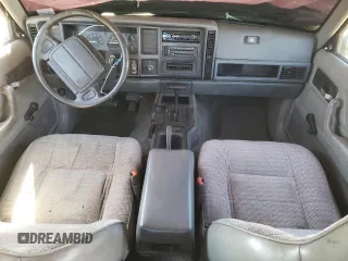 1996 Jeep Cherokee Sport with VIN 1J4FJ68S1TL317265, listed as a Copart auction lot 46427625 with 265,554 mi miles and Clean Title. Bid and sale history available at carsss.com. Image 8.