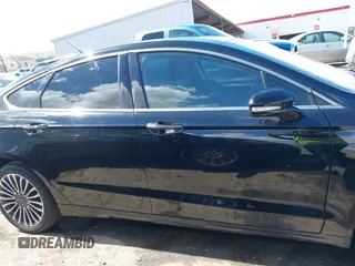 2017 Ford Fusion Titanium with VIN 3FA6P0SU0HR277268, listed as a IAAI auction lot 41798990 with 140,452 mi miles and . Bid and sale history available at DreamBid. Image 14.