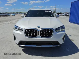 2024 BMW X4 xDrive30i z VIN 5UX33DT09R9W70709, wystawiony jako Copart lot #56997035 z przebiegiem 21 308 mil mil oraz Tytuł czysty. Historia ofert i sprzedaży dostępna na DreamBid. Obrazek 5.