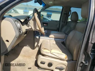 2006 Ford F-150 XLT with VIN 1FTPW12566FA46546, listed as a Copart auction lot 52697455 with 153,515 mi miles and Salvage Title. Bid and sale history available at DreamBid. Image 7.