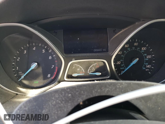 2014 Ford Focus SE with VIN 1FADP3F20EL340123, listed as a Copart auction lot 77626984 with 69,487 mi miles and Salvage Title. Bid and sale history available at DreamBid. Image 9.
