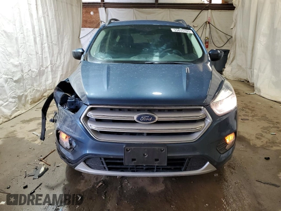 2018 Ford Escape SE z VIN 1FMCU9GD6JUC30324, wystawiony jako Copart lot #55833765 z przebiegiem 48 016 mil mil oraz Szkoda całkowita • Salvage title. Historia ofert i sprzedaży dostępna na DreamBid. Obrazek 5.