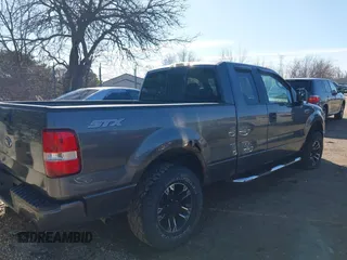 2005 Ford F-150 STX with VIN 1FTRX14W55NB19633, listed as a IAAI auction lot 41870057 with 100,436 mi miles. Bid and sale history available at carsss.com. Image 4.