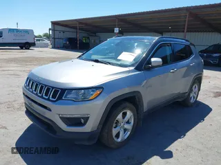 2020 Jeep Compass Latitude with VIN 3C4NJDBB9LT248652, listed as a IAAI auction lot 42237769 with 131,261 mi miles and . Bid and sale history available at DreamBid. Image 2.