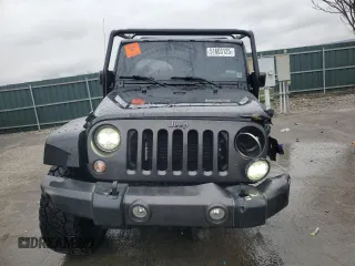 2017 Jeep Wrangler Sport z VIN 1C4AJWAG4HL563093, wystawiony jako Copart lot #51603125 z przebiegiem 105 618 mil mil oraz Szkoda całkowita • Salvage title. Historia ofert i sprzedaży dostępna na DreamBid. Obrazek 5.