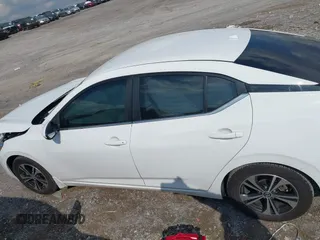 2022 Nissan Sentra SV with VIN 3N1AB8CV5NY299764, listed as a IAAI auction lot 42020411 with 41,171 mi miles and . Bid and sale history available at DreamBid. Image 14.