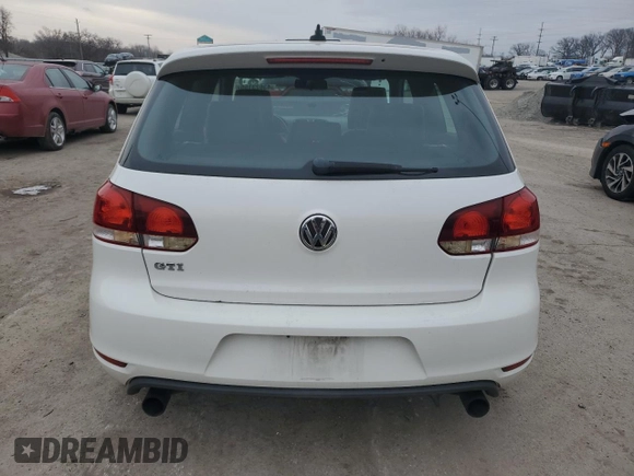 2012 Volkswagen GTI PZEV z VIN WVWED7AJ9CW107107, wystawiony jako Copart lot #43623155 z przebiegiem 193 560 mil mil oraz Szkoda całkowita • Salvage title. Historia ofert i sprzedaży dostępna na DreamBid. Obrazek 6.