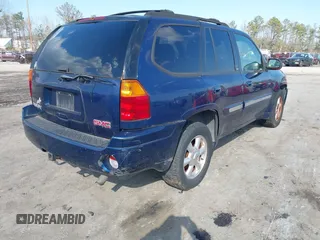 2003 GMC Envoy SLE with VIN 1GKDT13S432364768, listed as a IAAI auction lot 41467418 with 220,170 mi miles. Bid and sale history available at carsss.com. Image 4.