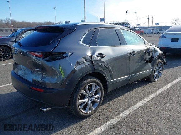 2022 Mazda CX-30 S Premium with VIN 3MVDMBDL9NM403273, listed as a IAAI auction lot 41607227 with Not Provided miles and . Bid and sale history available at carsss.com. Image 4.