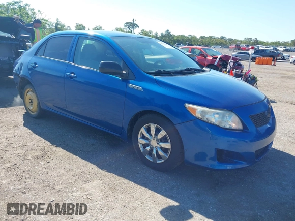 2009 Toyota Corolla with VIN JTDBL40E999021523, listed as a IAAI auction lot 42019856 with 194,011 mi miles. Bid and sale history available at carsss.com. Image 1.