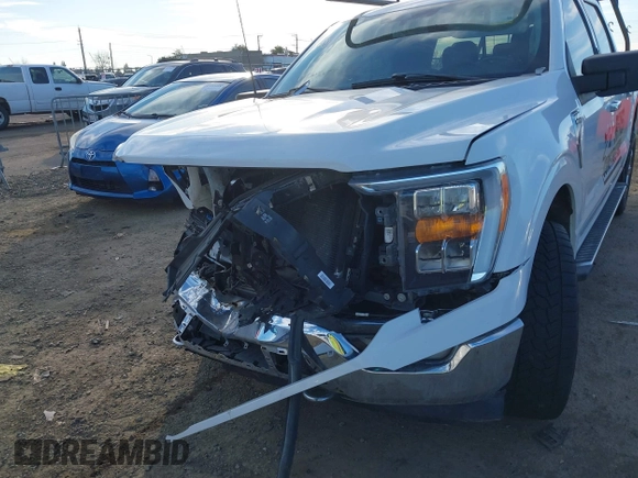 2021 Ford F-150 XL z VIN 1FTFW1E84MFB69972, wystawiony jako IAAI lot #41294390 z przebiegiem 60 336 mil mil oraz . Historia ofert i sprzedaży dostępna na DreamBid. Obrazek 6.