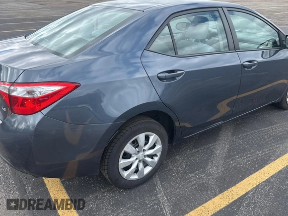 2014 Toyota Corolla L z VIN 2T1BURHE6EC077048, wystawiony jako Copart lot #62062695 z przebiegiem 199 669 mil mil oraz Czysty tytuł • Clean title. Historia ofert i sprzedaży dostępna na DreamBid. Obrazek 4.