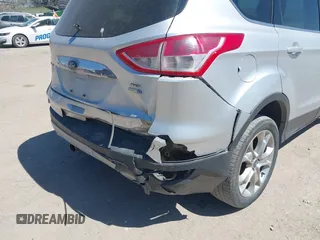 2013 Ford Escape SEL with VIN 1FMCU9H91DUA14749, listed as a IAAI auction lot 42039685 with 186,669 mi miles. Bid and sale history available at carsss.com. Image 6.