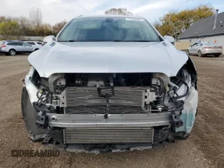 2016 Buick Envision Premium II with VIN LRBFXFSX3GD245654, listed as a Copart auction lot 77356864 with 66,922 mi miles and Salvage Title. Bid and sale history available at carsss.com. Image 5.