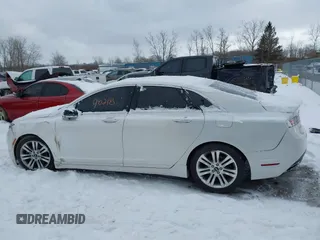 2015 Lincoln MKZ с VIN 3LN6L2JK2FR603436, выставлен на аукционе IAAI как лот 41598218 с пробегом 107 059 миль миль и . История ставок и продаж доступна на DreamBid. Изображение 14.