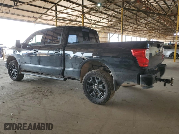 2019 Nissan Titan XD SL with VIN 1N6BA1F47KN534864, listed as a Copart auction lot 65651974 with 79,230 mi miles and Salvage Title. Bid and sale history available at carsss.com. Image 2.