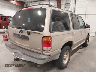1998 Ford Explorer XLT с VIN 1FMZU32E8WUA42113, выставлен на аукционе IAAI как лот 41608275 с пробегом 149 567 миль миль и . История ставок и продаж доступна на DreamBid. Изображение 4.
