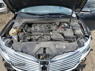 2014 Lincoln MKZ z VIN 3LN6L2GK5ER826026, wystawiony jako Copart lot #58941095 z przebiegiem 130 761 mil mil oraz Czysty tytuł • Clean title. Historia ofert i sprzedaży dostępna na DreamBid. Obrazek 11.