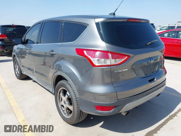 2014 Ford Escape SE with VIN 1FMCU0GX8EUD57801, listed as a IAAI auction lot 41856252 with 136,980 mi miles. Bid and sale history available at carsss.com. Image 3.