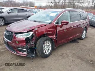 2021 Chrysler Pacifica Touring L with VIN 2C4RC1BG6MR597911, listed as a IAAI auction lot 41660729 with 72,004 mi miles and . Bid and sale history available at DreamBid. Image 20.