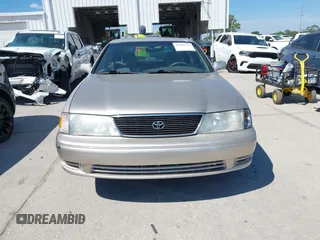 1998 Toyota Avalon XL with VIN 4T1BF18BXWU237742, listed as a IAAI auction lot 41881679 with Not Provided miles and . Bid and sale history available at DreamBid. Image 12.