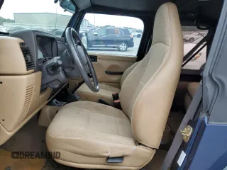 2002 Jeep Wrangler Sport with VIN 1J4FA49S62P704405, listed as a Copart auction lot 74531924 with 0 mi miles and Salvage Title. Bid and sale history available at carsss.com. Image 7.