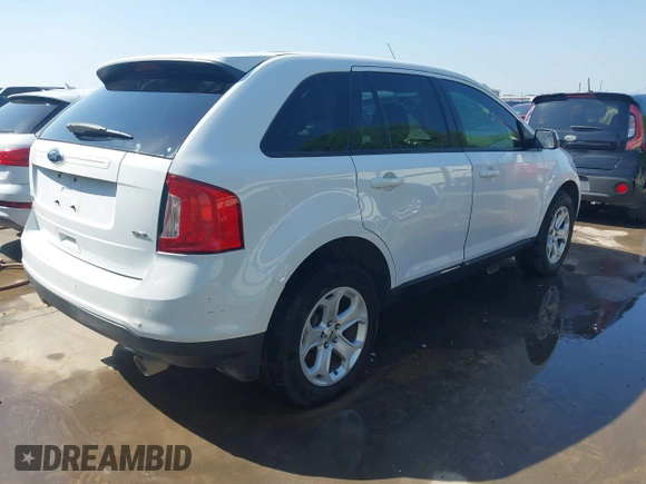2014 Ford Edge SEL with VIN 2FMDK3JC9EBB54536, listed as a IAAI auction lot 41867367 with 127,929 mi miles. Bid and sale history available at carsss.com. Image 4.
