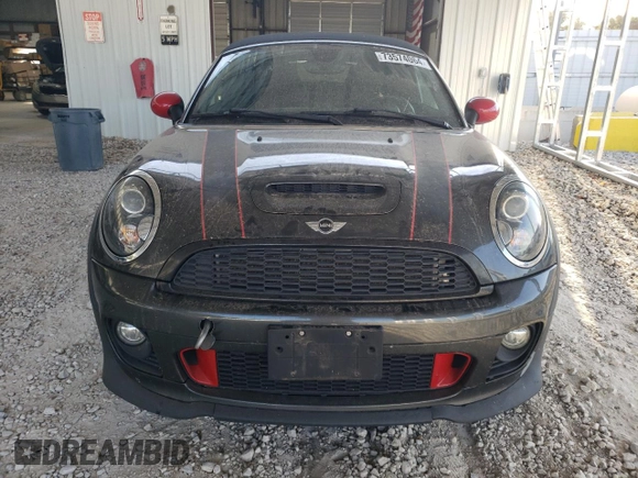 2015 MINI Roadster S z VIN WMWSY3C59FT566785, wystawiony jako Copart lot #73574064 z przebiegiem 96 623 mil mil oraz Tytuł czysty. Historia ofert i sprzedaży dostępna na DreamBid. Obrazek 5.