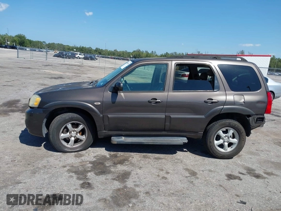 2006 Mazda Tribute i with VIN 4F2YZ02Z36KM29148, listed as a IAAI auction lot 42044163 with 175,786 mi miles and . Bid and sale history available at carsss.com. Image 14.