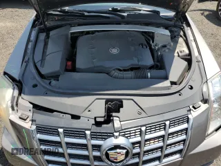 2012 Cadillac CTS Luxury with VIN 1G6DE5E54C0138040, listed as a Copart auction lot 61997305 with 140,996 mi miles and Salvage title. Bid and sale history available at DreamBid. Image 11.
